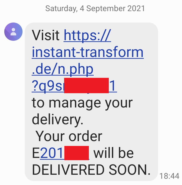 Text message that reads "Visit (website) to manage your delivery. Your order E201(redacted) will be DELIVERED SOON." Some identifying details from the message are covered with a bar.